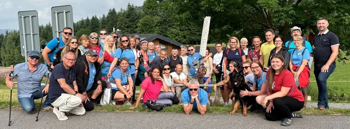 Grafika promocyjna wydarzenia Pochod po stopách hrdinů 08/2026 — marsz pamięci z Oświęcimia do Żyliny