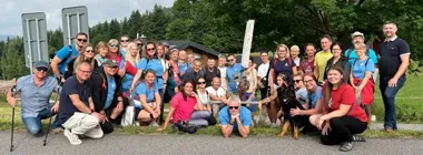 Grafika promocyjna wydarzenia Pochod po stopách hrdinů 08/2026 — marsz pamięci z Oświęcimia do Żyliny